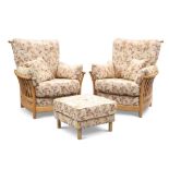 A PAIR OF ERCOL 'RENAISSANCE' LIGHT ELM LOUNGE CHAIRS AND FOOTSTOOL