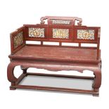 A CHINESE RED LACQUERED BENCH