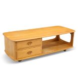 AN ERCOL 'MINERVA' LIGHT ELM TV STAND