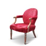 A REGENCY MAHOGANY AND UPHOLSTERED LIBRARY CHAIR