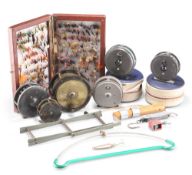 A QUANTITY OF FISHING REELS AND SUNDRIES