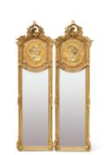 A PAIR OF PERIOD-STYLE GILT-COMPOSITION MIRRORS