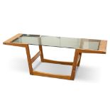 A DANISH TEAK AND SMOKED GLASS COFFEE TABLE, BY SIKA MOBLER, CIRCA 1960S