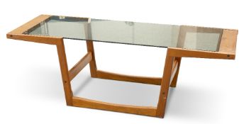 A DANISH TEAK AND SMOKED GLASS COFFEE TABLE, BY SIKA MOBLER, CIRCA 1960S
