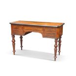 A CONTINENTAL EBONISED AND WALNUT DESK