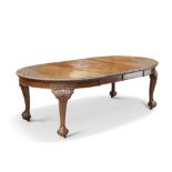 A VICTORIAN MAHOGANY CHIPPENDALE-STYLE WIND-OUT DINING TABLE