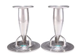 ARCHIBALD KNOX FOR LIBERTY & CO, A PAIR OF TUDRIC PEWTER AND ENAMEL CANDLESTICKS