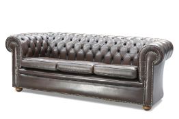A CHESTERFIELD DEEP-BUTTONED BROWN LEATHER SOFA