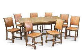 A PERIOD-STYLE OAK REFECTORY DINING TABLE AND EIGHT CHAIRS