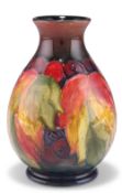 A WILLIAM MOORCROFT FLAMBÉ POTTERY VASE