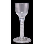 AN OPAQUE TWIST WINE GLASS, MID-18TH CENTURY
