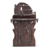 A CARVED OAK 'AGATHA SHIPTON' SPOON RACK