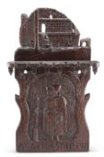 A CARVED OAK 'AGATHA SHIPTON' SPOON RACK