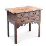 A GEORGE III MAHOGANY LOWBOY