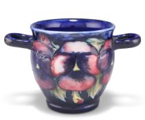 A WALTER MOORCROFT POTTERY TWIN-HANDLED JARDINIÈRE