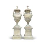 A PAIR OF EXCEPTIONALLY LARGE RECONSTITUTED STONE GARDEN URNS