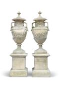 A PAIR OF EXCEPTIONALLY LARGE RECONSTITUTED STONE GARDEN URNS