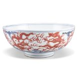 A CHINESE IRON-RED AND UNDERGLAZE BLUE 'DRAGON' BOWL