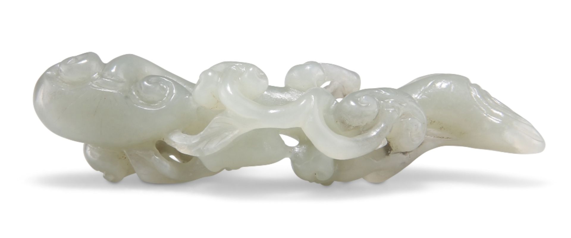 A CHINESE JADE CARVING OF SCROLLING LINGZHI FUNGUS
