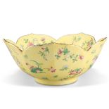 A CHINESE FAMILLE ROSE YELLOW-GROUND BOWL