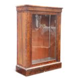 A 19TH CENTURY AMBOYNA MINIATURE PIER CABINET