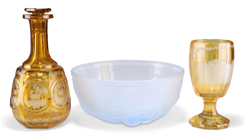 AN ART DECO MOULDED FROSTED BLUE GLASS BOWL, PROBABLY JOBLING, AND TWO PIECES OF GERMAN AMBER GLASS