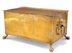 AN ENGRAVED BRASS TEA CADDY