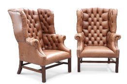 A GOOD PAIR OF DEEP-BUTTONED BROWN LEATHER WING-BACK LIBRARY CHAIRS