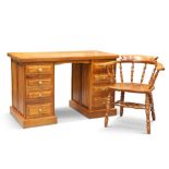 A CRYER CRAFT ELM DESK AND CAPTAIN'S CHAIR