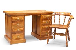 A CRYER CRAFT ELM DESK AND CAPTAIN'S CHAIR