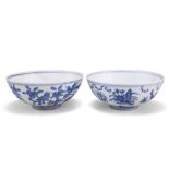 A NEAR PAIR OF CHINESE BLUE AND WHITE EGGSHELL BOWLS