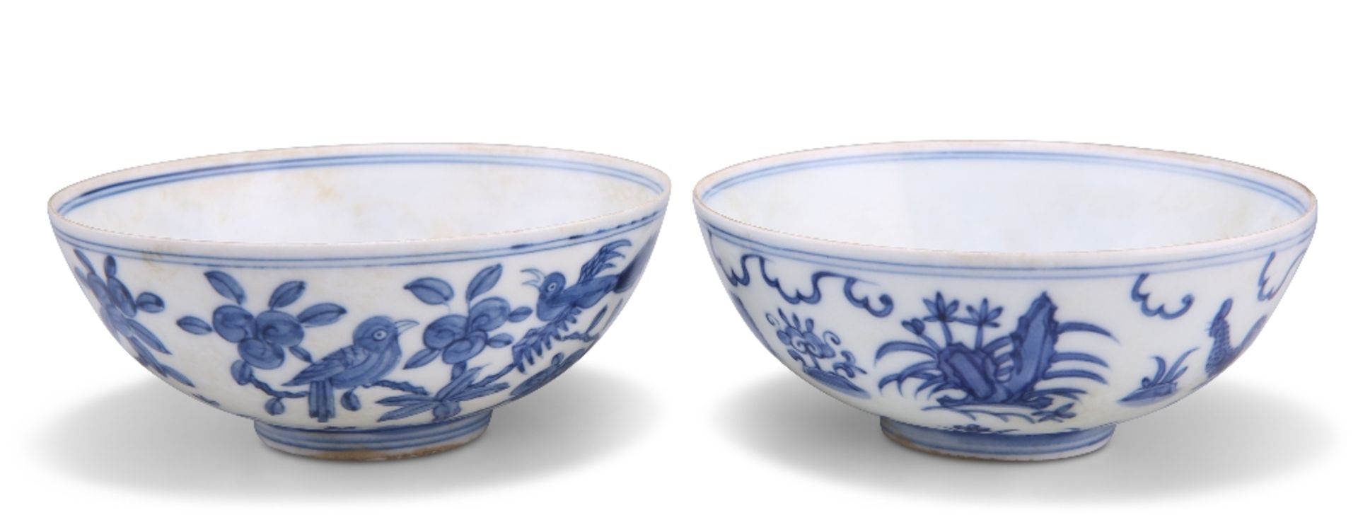 A NEAR PAIR OF CHINESE BLUE AND WHITE EGGSHELL BOWLS