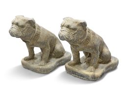 A PAIR OF RECONSTITUTED STONE BRITISH BULLDOGS