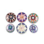 SIX VARIOUS STRATHEARN GLASS MILLEFIORI PAPERWEIGHTS