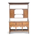 A GEORGE III OAK DRESSER