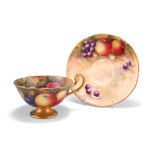 A ROYAL WORCESTER FRUIT PAINTED CUP AND SAUCER