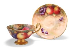 A ROYAL WORCESTER FRUIT PAINTED CUP AND SAUCER