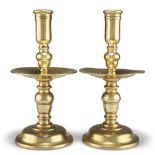 A LARGE PAIR OF HEEMSKIRK BRASS CANDLESTICKS