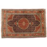 AN AFGHAN HERAT RUG