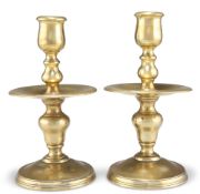 A PAIR OF HEEMSKIRK BRASS CANDLESTICKS