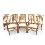 A SET OF EIGHT OAK DINING CHAIRS, ATTRIBUTED TO EDWARD BARNSLEY