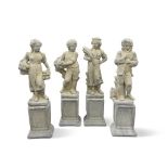 A SET OF FOUR RECONSTITUTED STONE GARDEN STATUES