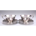 A PAIR OF FRENCH SILVER CHOCOLATE CUPS AND SAUCERS