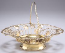 A GEORGE III SILVER-GILT PIERCED BASKET