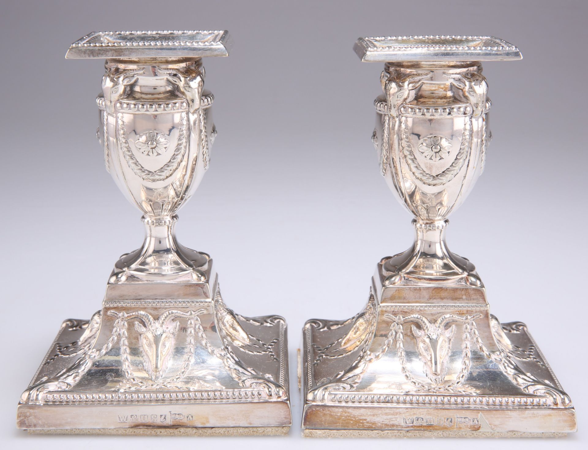 A PAIR OF ADAM REVIVAL SILVER-PLATED CANDLESTICKS