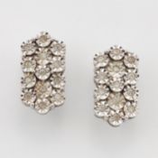 A PAIR OF 9 CARAT WHITE GOLD DIAMOND CLUSTER EARRINGS
