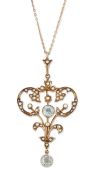 AN AQUAMARINE AND SEED PEARL PENDANT ON CHAIN