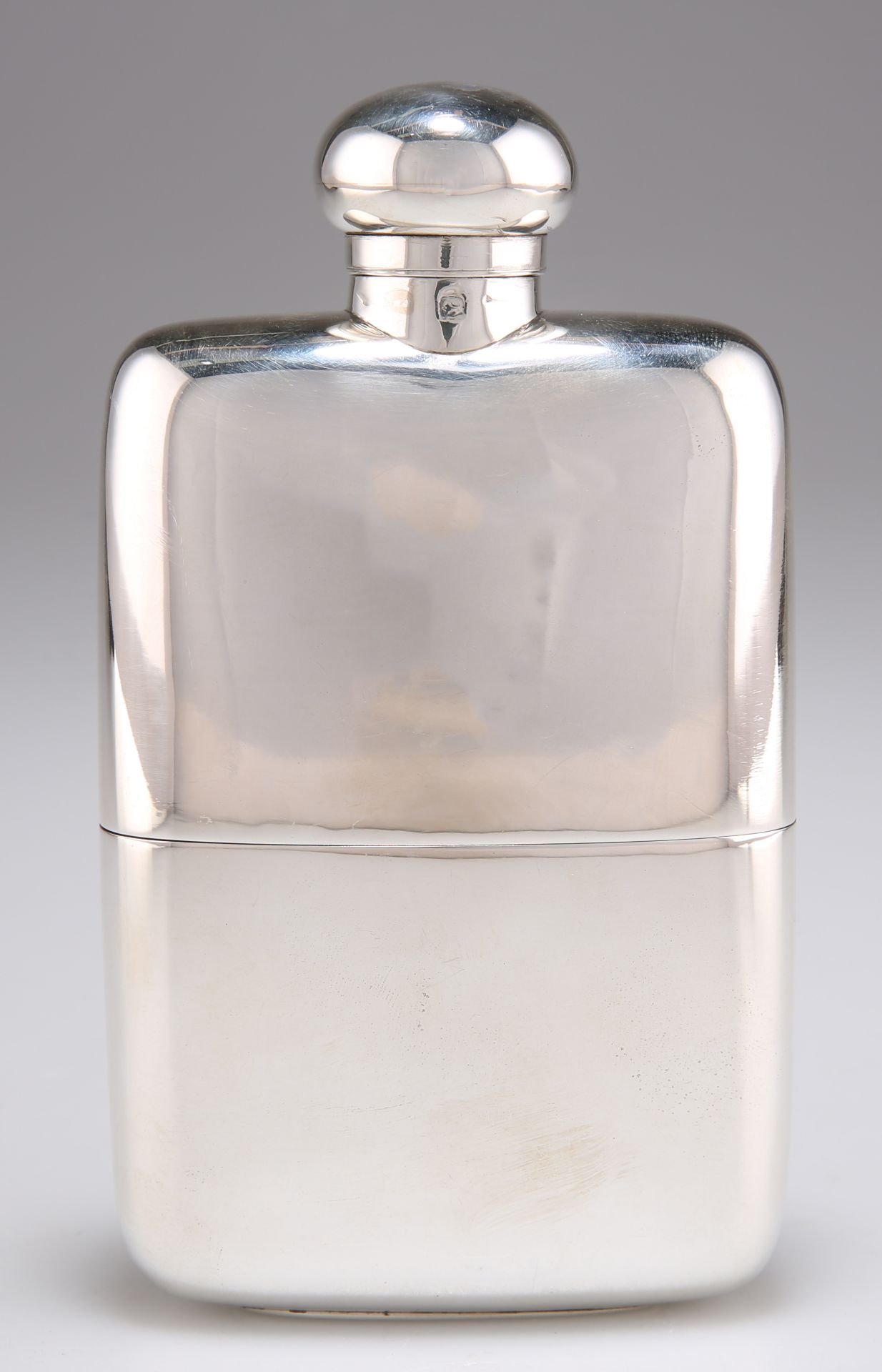 AN EDWARDIAN SILVER HIP FLASK