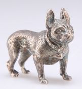 AN ELIZABETH II CAST SILVER MODEL OF A DOG