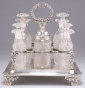 A GEORGE III SILVER EIGHT-BOTTLE CRUET STAND